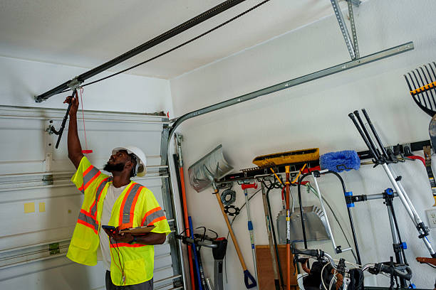 Professional Garage Door Panel Replacement technician working in Harrisburg, AR